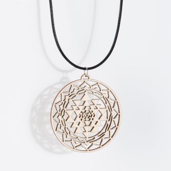 Sri Yantra necklace birch wood hanging isolated